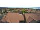 An expansive view showing the community's rooftop, parking, and well-maintained landscaping from above at 2300 E Silverado Ranch Blvd # 1070, Las Vegas, NV 89183
