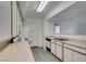Functional kitchen featuring white appliances and a view into the living area at 2300 E Silverado Ranch Blvd # 1070, Las Vegas, NV 89183