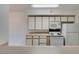 Bright kitchen with ample cabinets, countertops, and white appliances at 2300 E Silverado Ranch Blvd # 1070, Las Vegas, NV 89183
