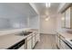 Spacious kitchen with light countertops and stainless steel sink at 2300 E Silverado Ranch Blvd # 1070, Las Vegas, NV 89183