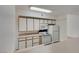 Well-lit kitchen with white appliances, plenty of cabinets, and countertop space at 2300 E Silverado Ranch Blvd # 1070, Las Vegas, NV 89183