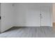 An empty living room shows neutral walls, hard floors, and a door frame at 2300 E Silverado Ranch Blvd # 1070, Las Vegas, NV 89183