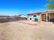 Spacious backyard with a patio area, offering potential for landscaping and outdoor enjoyment at 2337 Sierra Sunrise St, Las Vegas, NV 89156