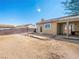 Large backyard showing the brick patio and partial covering outside the back of the house at 2337 Sierra Sunrise St, Las Vegas, NV 89156