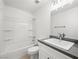 Bathroom with a shower-tub, modern sink, and granite countertop at 2337 Sierra Sunrise St, Las Vegas, NV 89156