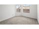Neutral bedroom with carpet and double windows for natural light at 2337 Sierra Sunrise St, Las Vegas, NV 89156