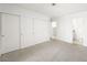 Bedroom with carpet, closet doors, and entry to the en-suite bathroom at 2337 Sierra Sunrise St, Las Vegas, NV 89156