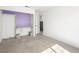 Bedroom with carpet floors features a built-in desk and closet space at 2337 Sierra Sunrise St, Las Vegas, NV 89156