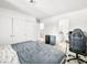 Comfortable bedroom with neutral carpet, closet, and access to the en-suite bathroom at 2337 Sierra Sunrise St, Las Vegas, NV 89156