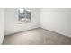 Bedroom with carpet, natural light, and views of the neighborhood at 2337 Sierra Sunrise St, Las Vegas, NV 89156