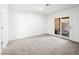 Cozy bedroom with neutral carpet and sliding glass doors at 2337 Sierra Sunrise St, Las Vegas, NV 89156