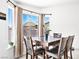 This dining area features natural light through large windows and an outdoor view at 2337 Sierra Sunrise St, Las Vegas, NV 89156