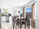 Bright dining area featuring large windows, modern lighting, and stylish, matching decor at 2337 Sierra Sunrise St, Las Vegas, NV 89156