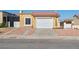 Charming single-story home with a red tile roof, desert landscaping, and an attached single-car garage at 2337 Sierra Sunrise St, Las Vegas, NV 89156