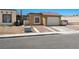 Charming single-story home featuring a well-maintained exterior, a one car garage and desert landscaping at 2337 Sierra Sunrise St, Las Vegas, NV 89156