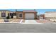 Charming single-story home featuring a well-maintained front yard, and a two car garage at 2337 Sierra Sunrise St, Las Vegas, NV 89156
