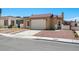 Charming single-story home featuring a well-maintained exterior, a one car garage and desert landscaping at 2337 Sierra Sunrise St, Las Vegas, NV 89156