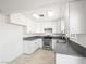 Clean kitchen featuring white cabinets, stainless steel appliances, and granite countertops at 2337 Sierra Sunrise St, Las Vegas, NV 89156