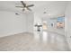 Inviting living room with tile floors, recessed lights, and kitchen access at 2337 Sierra Sunrise St, Las Vegas, NV 89156