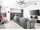 Spacious living room with comfortable seating, a large TV, and natural light at 2337 Sierra Sunrise St, Las Vegas, NV 89156