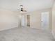 Spacious bedroom with neutral colors, tile flooring, and ample natural light for a serene retreat at 2375 Marion St, Las Vegas, NV 89104