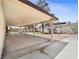 Large, covered carport area with ample space for parking and storage at 2375 Marion St, Las Vegas, NV 89104
