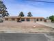 Charming single-story home featuring a well-maintained front yard landscape at 2375 Marion St, Las Vegas, NV 89104