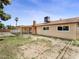 Side view of a single-story house with a covered patio and well-maintained exterior at 2375 Marion St, Las Vegas, NV 89104