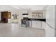 Stylish kitchen equipped with stainless steel appliances, black countertops, and seamless access to the outdoor space at 2375 Marion St, Las Vegas, NV 89104
