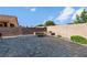 This backyard features a fire pit and paver patio, perfect for outdoor entertaining at 258 Chamomile Dr, Henderson, NV 89015