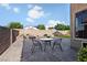 This backyard features a table and chairs with a fire pit and block wall at 258 Chamomile Dr, Henderson, NV 89015