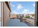 This home features a private balcony overlooking the surrounding neighborhood and blue sky at 258 Chamomile Dr, Henderson, NV 89015
