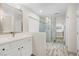 Beautiful bathroom featuring a glass-enclosed shower and vanity, providing a spa-like experience at 258 Chamomile Dr, Henderson, NV 89015