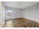 Inviting bedroom with wood floors, closet, natural light, and neutral paint color at 258 Chamomile Dr, Henderson, NV 89015