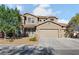 Beautiful two-story home featuring a three-car garage and well-maintained landscaping at 258 Chamomile Dr, Henderson, NV 89015