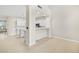 Bright and airy living space featuring a bar-height counter overlooking the kitchen at 258 Chamomile Dr, Henderson, NV 89015