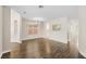 An expansive open room features hardwood floors, arched doorways and lots of natural light at 258 Chamomile Dr, Henderson, NV 89015