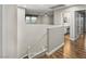 Upstairs loft area featuring wood floors, natural light, and easy access to bedrooms at 258 Chamomile Dr, Henderson, NV 89015