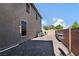 This home features a side yard with a paver patio and access to the air conditioning units at 258 Chamomile Dr, Henderson, NV 89015