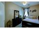 Cozy bedroom with a comfortable bed, stylish furnishings, and ample natural light for a relaxing retreat at 3048 Scalise Ct, Las Vegas, NV 89141