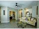 Open-concept living room featuring tile floors and lots of natural light at 3048 Scalise Ct, Las Vegas, NV 89141