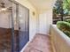 Outdoor balcony featuring sliding glass doors and a storage closet at 3135 S Mojave Rd # 152, Las Vegas, NV 89121