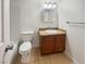 Bathroom with a white toilet, a single-sink vanity with granite countertop, and a shower-tub combo at 3135 S Mojave Rd # 152, Las Vegas, NV 89121