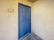Unit 152 features a bright blue front door at 3135 S Mojave Rd # 152, Las Vegas, NV 89121