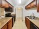 Well-lit kitchen boasts stainless steel appliances and ample storage at 3135 S Mojave Rd # 152, Las Vegas, NV 89121