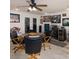 The dining area has tile flooring, unique wall decor, and a ceiling fan at 3233 Southridge Ave, Las Vegas, NV 89121