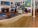 Inviting living room features a fireplace, plush seating, and unique art decor at 3233 Southridge Ave, Las Vegas, NV 89121