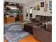 Relaxing living room with built-in shelving and a comfortable sectional couch at 3233 Southridge Ave, Las Vegas, NV 89121