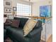 Upstairs living room with a comfortable sofa and view from the top of the stairwell at 3233 Southridge Ave, Las Vegas, NV 89121