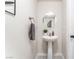 Chic half-bathroom featuring a pedestal sink and modern decor at 3309 Green Ice Ave, North Las Vegas, NV 89081